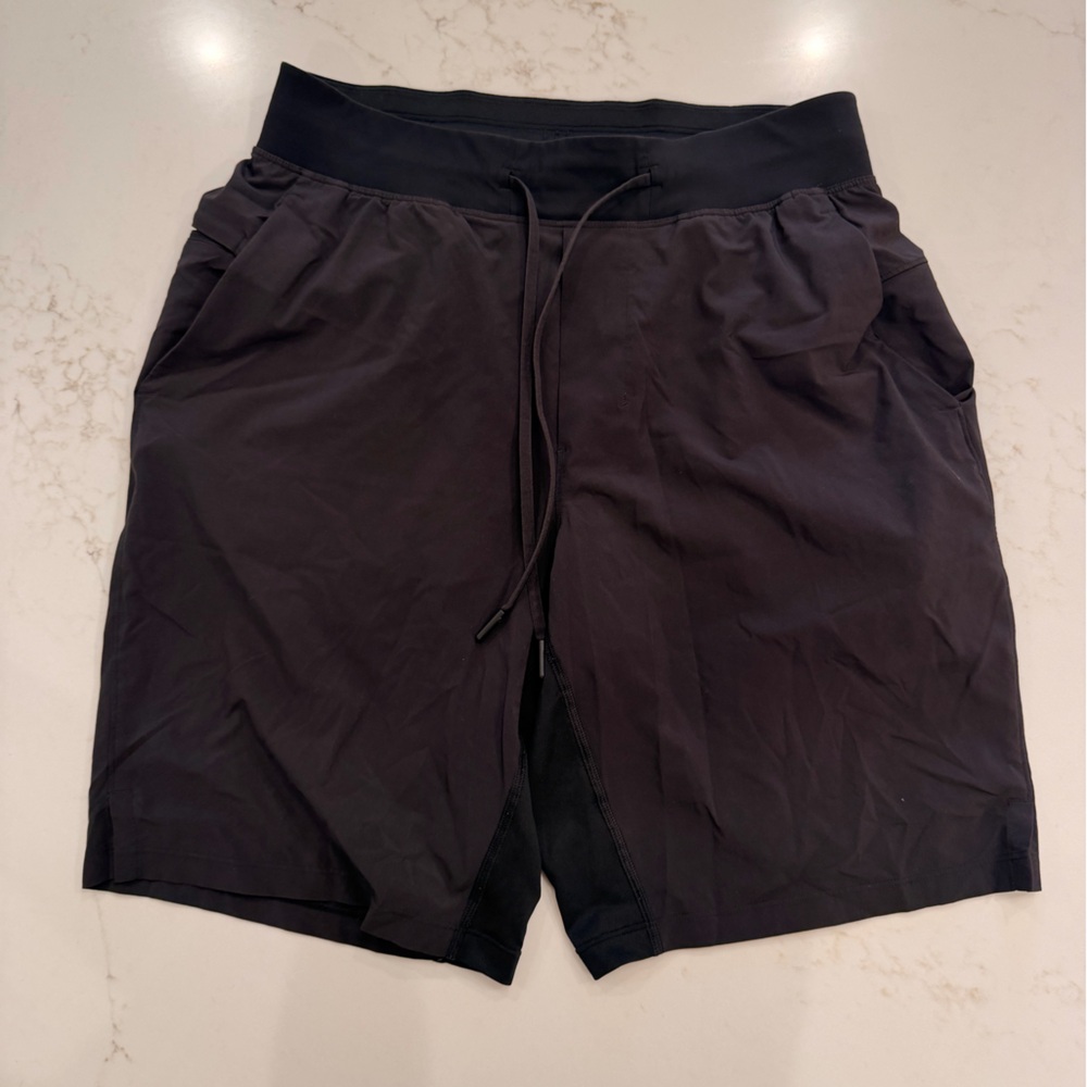 Lululemon women’s Small black Lined Training Shorts Drawstring Zip Pocket